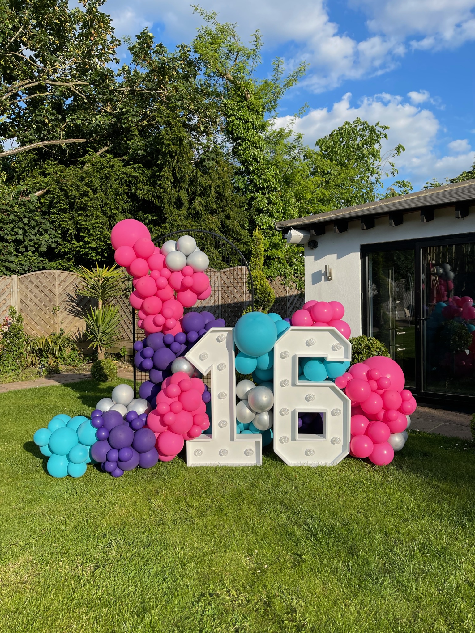 16 light up numbers with balloons